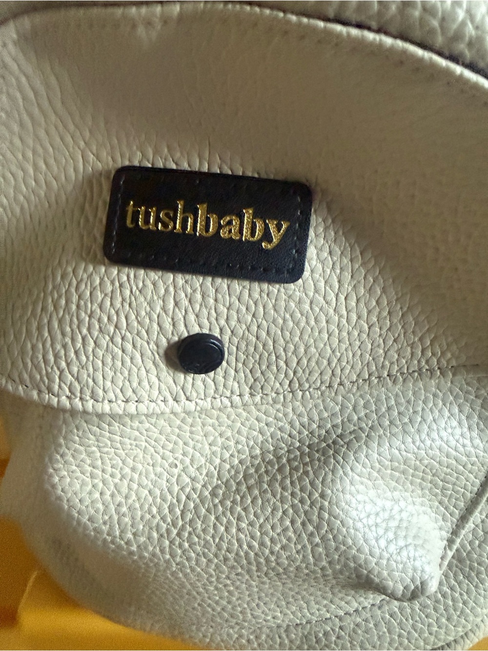 Tushbaby Cream Pebbled Leather Baby Bag